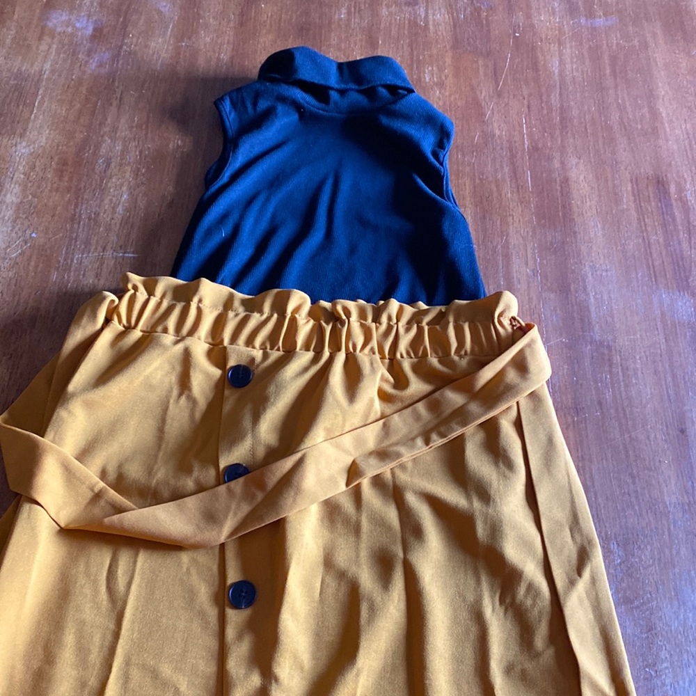 Orange skirt black tank turtle neck top